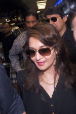 Madhuri dixit snapped with husband in Mumbai Airport on 6th April 2012 (28).jpg